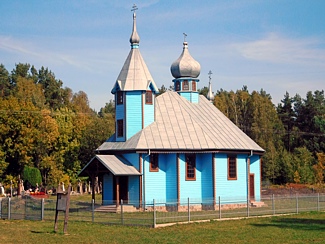 Kleine Kirche am Wegrand auf der Fahrt durch Polen. Stephen Rakowski vom Fahrradladen Radelkowski in Berlin Lichtenberg auf seiner Fahrradfahrt nach Polen, Litauen und Russland im September 2015.